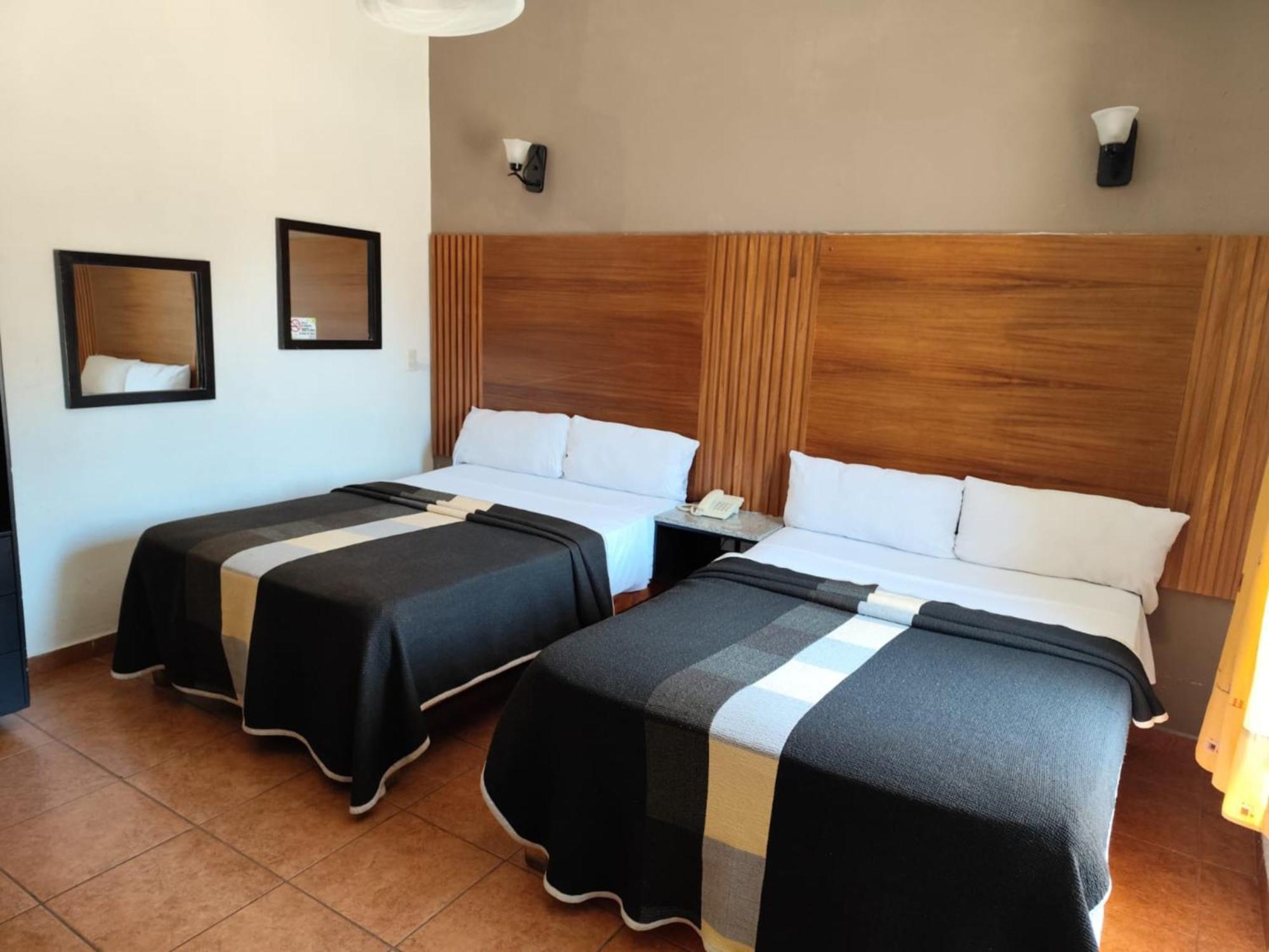 Hotel Aquiles Guadalajara Quarto foto